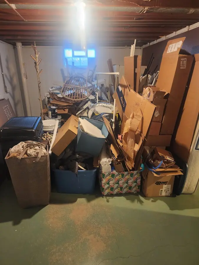 Roll-off dumpster container at job site for Yard Waste Dumpster Rental in Tipton